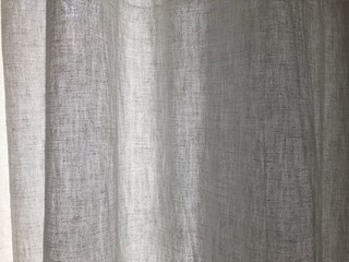 Fototapeta premium Linen curtain on a sunny day background 01