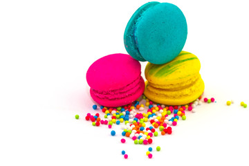 Fototapeta na wymiar Sweet and colourful french macaroons or macaron isolated on white backgroud with sugar topping.