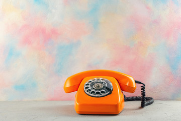 Orange vintage telephone