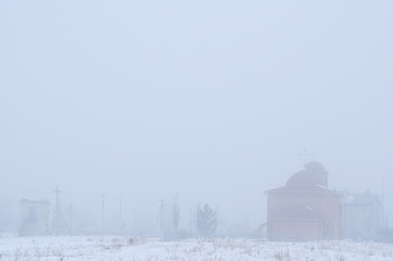 foggy landscape of village. gray background