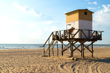 Lifeguard tower in the beach. Morning of summer. Atlantic coast. Mar de las Pampas. Argentina. 