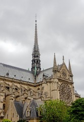 Fototapeta na wymiar Paris / France - 07.05.2014: Notre-Dame de Paris, famous Catholic cathedral, historical and architectural monument