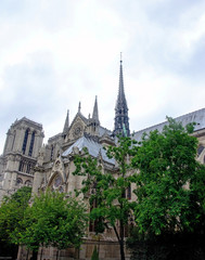 Fototapeta na wymiar Paris / France - 07.05.2014: Notre-Dame de Paris, famous Catholic cathedral, historical and architectural monument