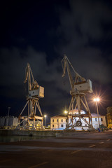 Dock cranes at night