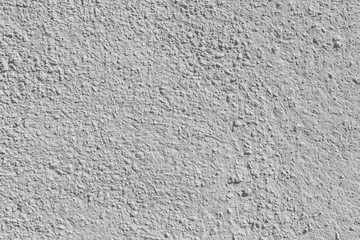 Beautiful horizontal texture of part of old concrete wall painted in gray and white color and with holes on the photo