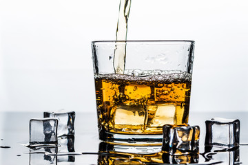 Whisky, whiskey or bourbon with ice
