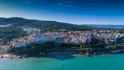 Naklejka na ściany i meble 16261_Aerial_shot_of_the_white_apartment_buildings_in_the_coastal_town_in_Italy.jpg