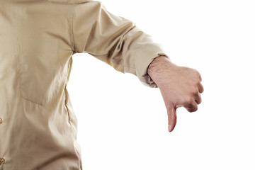 Close up man showing thumb down on white background