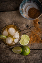 Caipirinha of Brazil, Top view of refreshment summer drink, cinnamon lime ice