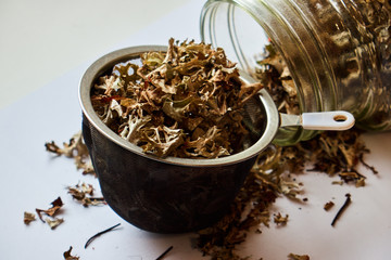 Tea ceremony , sieve with dry flower tea leaves , Asia culture design concept tea cup