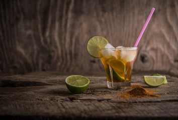 Summer refreshment drink over rustic wood and copy space