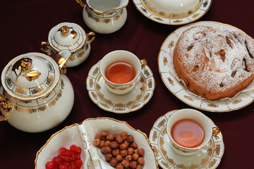 cup of coffee and cake on wooden table