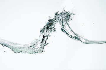Wave of water against a white background
