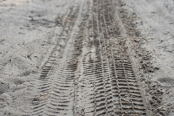 country road with tyre  prints selective focus