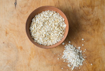 Oats in the bowl on table
