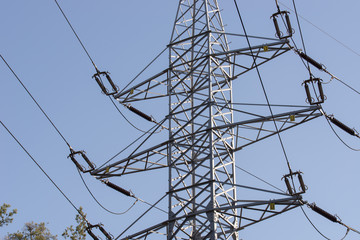 electric power lines and pylon on blue sky
