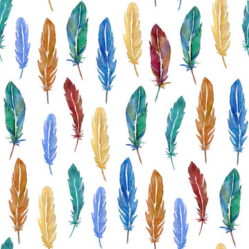 Seamless pattern of colorful watercolor feathers. Hand drawn