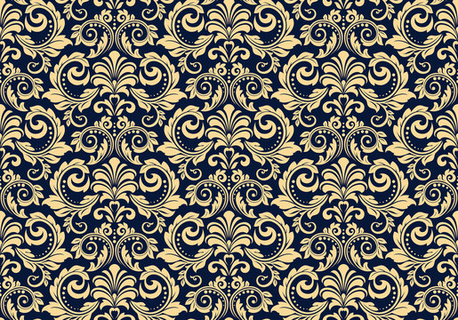 Wallpaper in the style of Baroque. Seamless vector background. Dark blue and gold floral ornament. Graphic pattern for fabric, wallpaper, packaging. Ornate Damask flower ornament