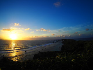 Fototapeta premium Sunset seen from the sea of Okinawa