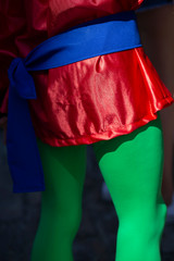 Man disguised wearing green tights