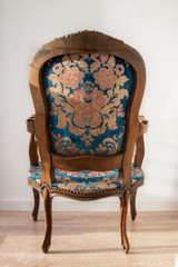 Renovation of old furniture as an antique Victorian old wooden armchair.