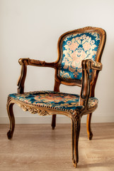 Renovation of old furniture as an antique Victorian old wooden armchair.