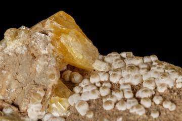 Macro stone Aragonite mineral on a black background