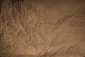 old crumpled plain wrapping paper texture background