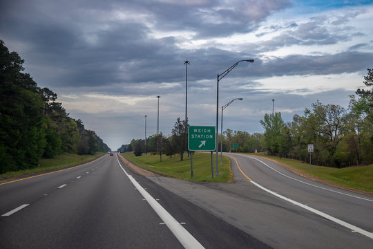 Exit Sign For A Weigh Station For Trucks In The Interstate