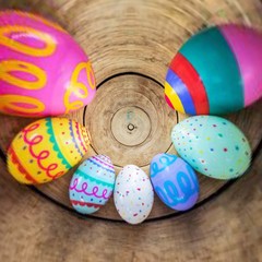 colorful easter eggs on wooden background