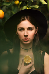 Portrait of a woman with a hat close-up