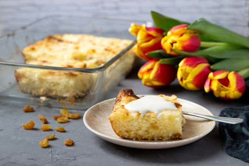Cottage cheese casserole with raisins for breakfast.