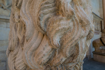 Carved mane on a lion marble sculpture