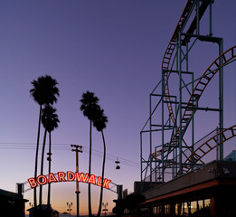 rollercoaster wheel at sunrise