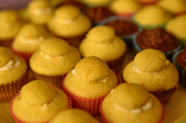 A tray full of cupcakes