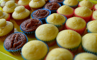 A tray full of cupcakes