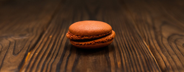 Cake macaron or macaroon on background, colorful almond cookies, pastel colors, vintage card