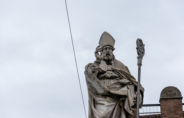 Fototapeta premium Ancient statue of a saint in Italy, Bologna