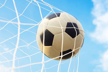 Soccer ball with net in goal