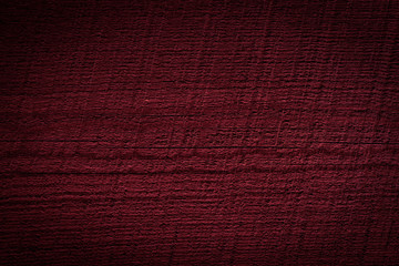 Texture of dark burgundy old rough wood. Mahogany abstract background for design. Vintage retro