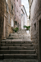 Fototapeta na wymiar Alleyway in Korcula Old Town, Korcula Island in Dalmatian Coast of Croatia