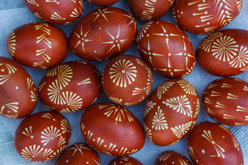 Ukrainian painted easter eggs of red color. Close-up