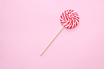Candy is on the diagonal. Red and white stripes on the candy.