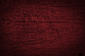 Texture of dark burgundy old rough wood. Mahogany abstract background for design. Vintage retro