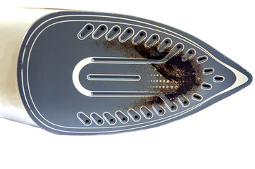 burned iron on a white background close-up