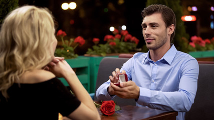 Lady accepting proposal to marry beloved man, romantic date, important decision