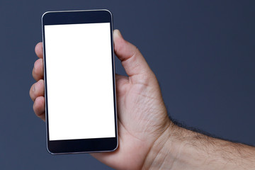Hand holding cellphone with clear screen at isolated background