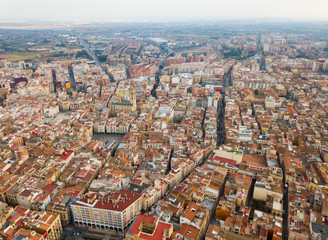 Fototapeta na wymiar Aerial view of the roofs of the spanish city of Reus. Tarragona province. Catalonia. Spain