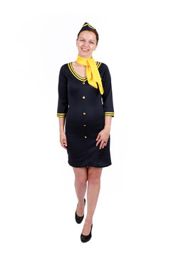  Stewardesse - Charming and smiling stewardess wearing in the blue uniform. Isolated on white background