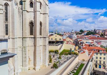 Fototapeta na wymiar View over the rooftops of Lisbon, Portugal from the elevator de santa justa or santa just a lift which was built in 1902 to connect lower streets